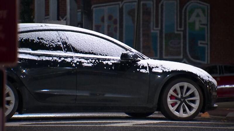 Snow accumulates on a car in Blairsville, GA. It is the first freeze of the season.